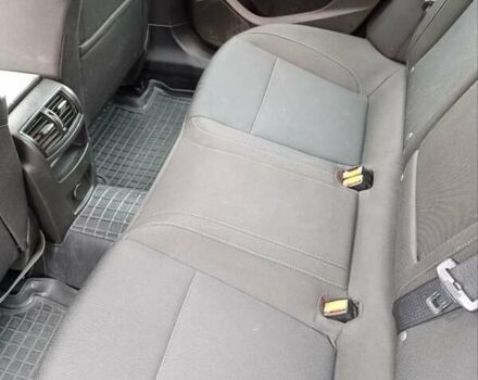 Черный Опель Инсигния, объемом двигателя 1.96 л и пробегом 177 тыс. км за 6500 $, фото 6 на Automoto.ua