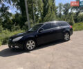 Черный Опель Инсигния, объемом двигателя 2 л и пробегом 248 тыс. км за 6700 $, фото 1 на Automoto.ua