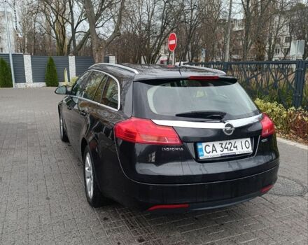 Чорний Опель Інсігнія, об'ємом двигуна 2 л та пробігом 175 тис. км за 6700 $, фото 4 на Automoto.ua