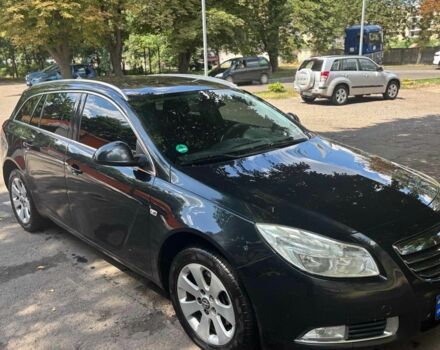 Чорний Опель Інсігнія, об'ємом двигуна 2 л та пробігом 293 тис. км за 7200 $, фото 2 на Automoto.ua