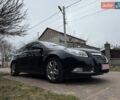 Чорний Опель Інсігнія, об'ємом двигуна 1.6 л та пробігом 204 тис. км за 7900 $, фото 1 на Automoto.ua