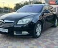 Чорний Опель Інсігнія, об'ємом двигуна 2 л та пробігом 312 тис. км за 5999 $, фото 1 на Automoto.ua