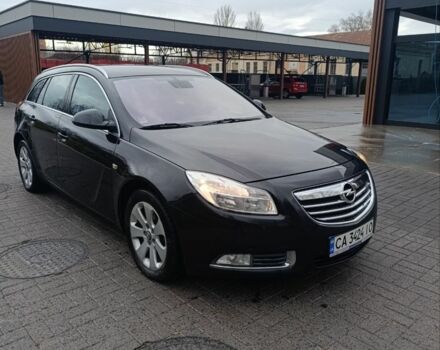 Чорний Опель Інсігнія, об'ємом двигуна 2 л та пробігом 175 тис. км за 6700 $, фото 1 на Automoto.ua