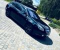 Чорний Опель Інсігнія, об'ємом двигуна 2 л та пробігом 207 тис. км за 7300 $, фото 1 на Automoto.ua