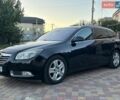 Чорний Опель Інсігнія, об'ємом двигуна 2 л та пробігом 312 тис. км за 5999 $, фото 3 на Automoto.ua