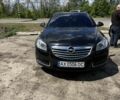 Чорний Опель Інсігнія, об'ємом двигуна 2 л та пробігом 204 тис. км за 7000 $, фото 1 на Automoto.ua