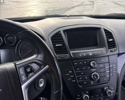 Черный Опель Инсигния, объемом двигателя 2 л и пробегом 265 тыс. км за 7250 $, фото 3 на Automoto.ua