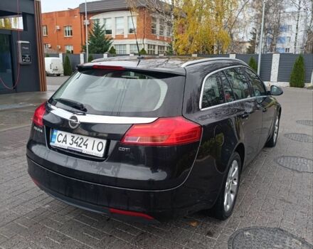 Чорний Опель Інсігнія, об'ємом двигуна 2 л та пробігом 175 тис. км за 6700 $, фото 3 на Automoto.ua