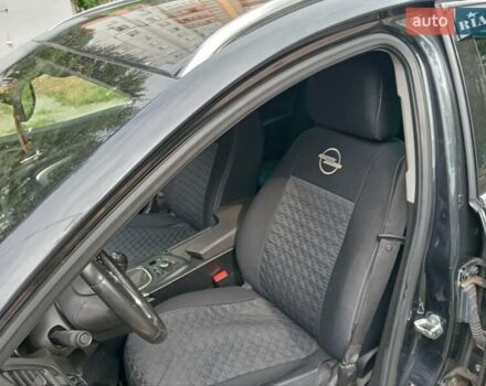 Черный Опель Инсигния, объемом двигателя 1.96 л и пробегом 236 тыс. км за 7500 $, фото 6 на Automoto.ua