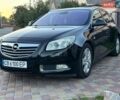 Чорний Опель Інсігнія, об'ємом двигуна 2 л та пробігом 312 тис. км за 5999 $, фото 1 на Automoto.ua