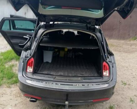 Черный Опель Инсигния, объемом двигателя 1.96 л и пробегом 236 тыс. км за 7500 $, фото 3 на Automoto.ua