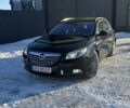 Чорний Опель Інсігнія, об'ємом двигуна 2 л та пробігом 299 тис. км за 6350 $, фото 1 на Automoto.ua