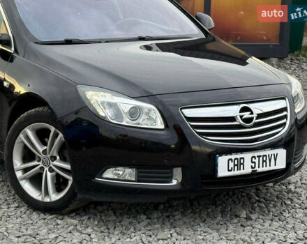 Черный Опель Инсигния, объемом двигателя 1.96 л и пробегом 242 тыс. км за 7600 $, фото 11 на Automoto.ua