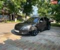 Чорний Опель Інсігнія, об'ємом двигуна 2 л та пробігом 340 тис. км за 5600 $, фото 5 на Automoto.ua