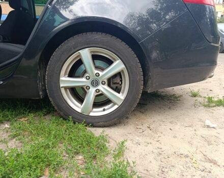 Чорний Опель Інсігнія, об'ємом двигуна 2 л та пробігом 236 тис. км за 7500 $, фото 3 на Automoto.ua