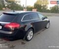 Черный Опель Инсигния, объемом двигателя 1.96 л и пробегом 250 тыс. км за 6400 $, фото 6 на Automoto.ua