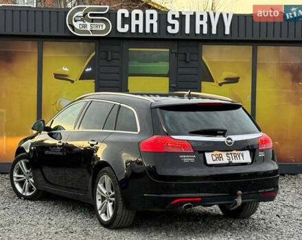 Черный Опель Инсигния, объемом двигателя 1.96 л и пробегом 242 тыс. км за 7600 $, фото 10 на Automoto.ua