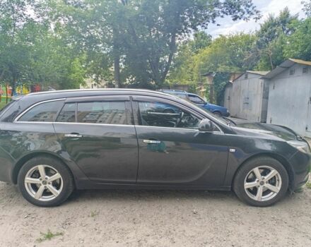 Чорний Опель Інсігнія, об'ємом двигуна 2 л та пробігом 236 тис. км за 7500 $, фото 1 на Automoto.ua