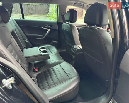 Черный Опель Инсигния, объемом двигателя 1.6 л и пробегом 204 тыс. км за 8300 $, фото 45 на Automoto.ua