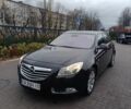 Чорний Опель Інсігнія, об'ємом двигуна 2 л та пробігом 175 тис. км за 6700 $, фото 1 на Automoto.ua