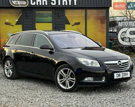 Черный Опель Инсигния, объемом двигателя 1.96 л и пробегом 242 тыс. км за 7600 $, фото 6 на Automoto.ua
