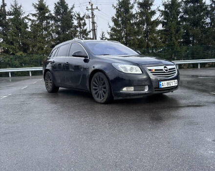 Черный Опель Инсигния, объемом двигателя 2 л и пробегом 265 тыс. км за 7250 $, фото 1 на Automoto.ua