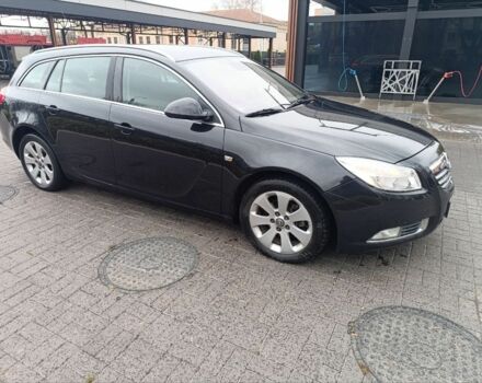 Чорний Опель Інсігнія, об'ємом двигуна 2 л та пробігом 175 тис. км за 6700 $, фото 2 на Automoto.ua