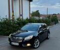 Черный Опель Инсигния, объемом двигателя 1.96 л и пробегом 194 тыс. км за 6500 $, фото 1 на Automoto.ua