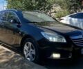Черный Опель Инсигния, объемом двигателя 1.96 л и пробегом 321 тыс. км за 7200 $, фото 1 на Automoto.ua