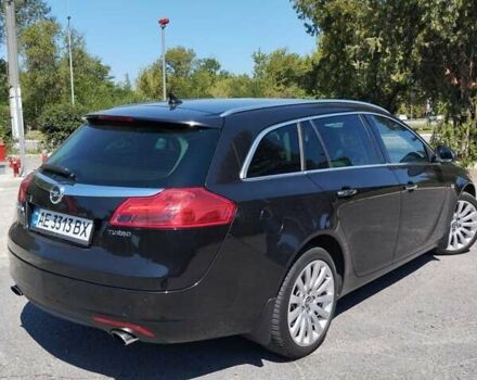 Чорний Опель Інсігнія, об'ємом двигуна 2 л та пробігом 211 тис. км за 9900 $, фото 3 на Automoto.ua