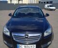 Черный Опель Инсигния, объемом двигателя 2 л и пробегом 170 тыс. км за 7300 $, фото 1 на Automoto.ua