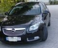Чорний Опель Інсігнія, об'ємом двигуна 2 л та пробігом 266 тис. км за 5700 $, фото 1 на Automoto.ua