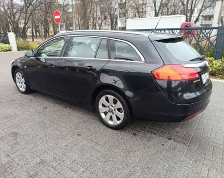 Чорний Опель Інсігнія, об'ємом двигуна 2 л та пробігом 175 тис. км за 6700 $, фото 5 на Automoto.ua