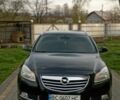 Черный Опель Инсигния, объемом двигателя 2 л и пробегом 244 тыс. км за 7700 $, фото 1 на Automoto.ua