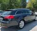 Черный Опель Инсигния, объемом двигателя 2 л и пробегом 240 тыс. км за 6750 $, фото 2 на Automoto.ua