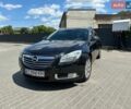 Черный Опель Инсигния, объемом двигателя 2 л и пробегом 240 тыс. км за 6750 $, фото 1 на Automoto.ua