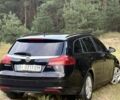 Чорний Опель Інсігнія, об'ємом двигуна 2 л та пробігом 220 тис. км за 7899 $, фото 6 на Automoto.ua