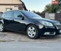 Чорний Опель Інсігнія, об'ємом двигуна 2 л та пробігом 312 тис. км за 5999 $, фото 4 на Automoto.ua