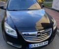 Черный Опель Инсигния, объемом двигателя 1.96 л и пробегом 208 тыс. км за 6750 $, фото 1 на Automoto.ua
