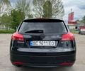 Черный Опель Инсигния, объемом двигателя 2 л и пробегом 230 тыс. км за 8000 $, фото 6 на Automoto.ua