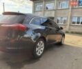 Черный Опель Инсигния, объемом двигателя 2 л и пробегом 324 тыс. км за 7200 $, фото 3 на Automoto.ua