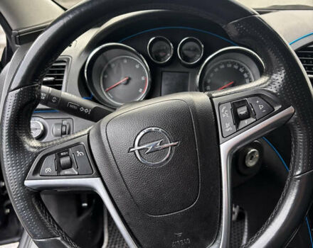 Черный Опель Инсигния, объемом двигателя 2 л и пробегом 265 тыс. км за 7250 $, фото 2 на Automoto.ua