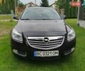 Черный Опель Инсигния, объемом двигателя 2 л и пробегом 260 тыс. км за 6300 $, фото 1 на Automoto.ua