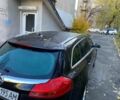Чорний Опель Інсігнія, об'ємом двигуна 2 л та пробігом 208 тис. км за 6802 $, фото 2 на Automoto.ua