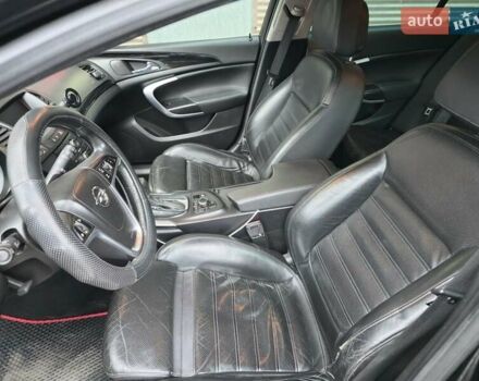 Чорний Опель Інсігнія, об'ємом двигуна 1.96 л та пробігом 412 тис. км за 6950 $, фото 12 на Automoto.ua