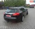 Черный Опель Инсигния, объемом двигателя 1.8 л и пробегом 260 тыс. км за 6499 $, фото 7 на Automoto.ua
