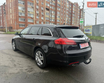 Чорний Опель Інсігнія, об'ємом двигуна 1.6 л та пробігом 204 тис. км за 8000 $, фото 4 на Automoto.ua