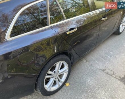 Черный Опель Инсигния, объемом двигателя 1.96 л и пробегом 208 тыс. км за 7750 $, фото 16 на Automoto.ua