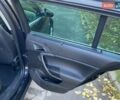 Черный Опель Инсигния, объемом двигателя 1.96 л и пробегом 208 тыс. км за 7750 $, фото 30 на Automoto.ua
