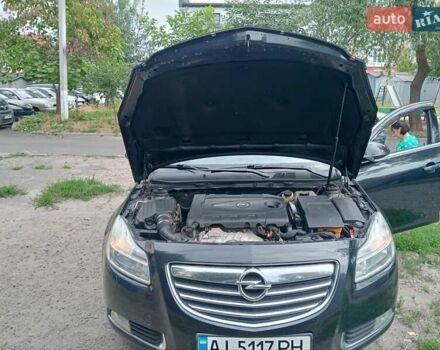 Черный Опель Инсигния, объемом двигателя 1.96 л и пробегом 236 тыс. км за 7500 $, фото 9 на Automoto.ua